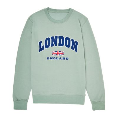 A light-green sweatshirt with long sleeves and a round neck. The chest has a print that reads, London, England, and features the Union Jack in the middle. 