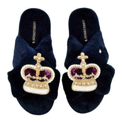 Crown Slippers - Navy blue faux fur slippers with sequin purple & gold crowns made up of faux gems. 