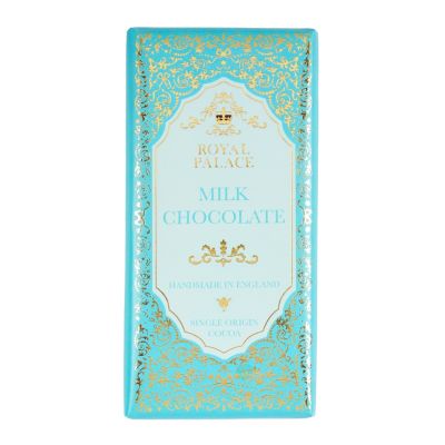A rectangular chocolate bar in a light-blue and gold ornately designed wrapper. The text on the front reads, Royal Palace Milk Chocolate. Handmade in England. Single origin cocoa. 
