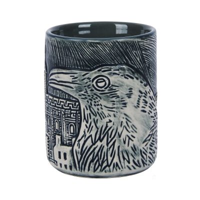 Black mug with sculpted raven and Tower of London images