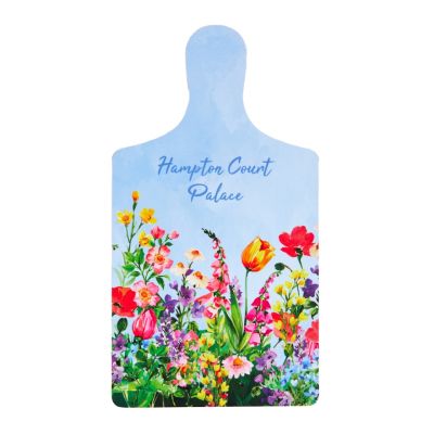 A blue chopping board with a handle, featuring a colourful illustration of flowers from Hampton Court Palace.