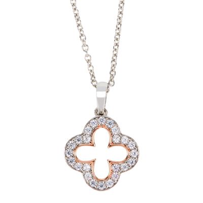 A silver cut-out quatrefoil pendant necklace inlaid with a border of 22 white topaz stones.