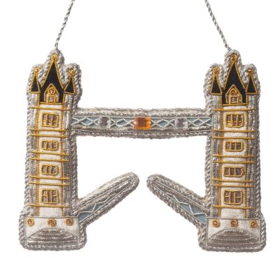An embroidered Tower Bridge hanging decoration trimmed with silver cord
