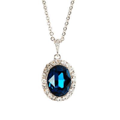Oval sapphire silver pendant encased in diamonds 