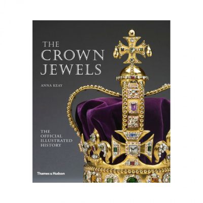 A book cover of The Crown Jewels: The Official Illustrated History book with a detailed photograph of the St Edward's Crown on the cover.