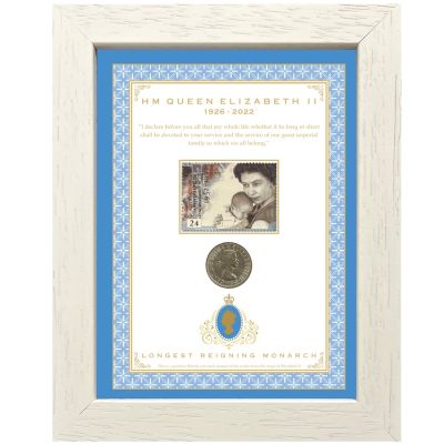 White and blue framed set of coin and stamp of Queen Elizabeth II