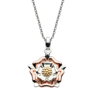 A sterling silver pendent necklace in the shape of a Tudor rose with rose gold and yellow gold petal details. 