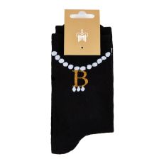 A pair of black women's socks with a print of Anne Boleyn's "B" necklace in white and gold. 