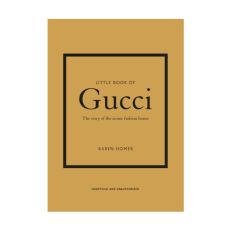 Gold book cover with Gucci logo