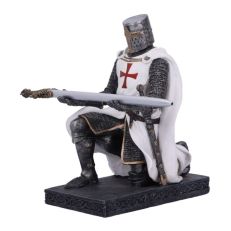 A metallic coloured kneeling knight figurine wearing chainmail and a white surcoat. His outstretched arms work as a pen holder and the pen is shaped like a sword. 