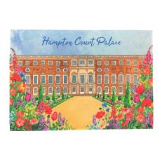 A bright, illustrated tea towel with a design of Hampton Court Palace's South Front with the gardens in the foreground filled with colourful flowers.