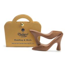 Two chocolate bars in the shape of a stiletto heel. They come packaged in a gold box in the shape of a handbag.