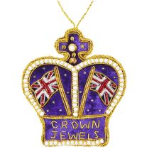 A purple velvet Crown Jewels hanging decoration with gold embroidery