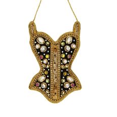 A corset shaped black velvet hanging decoration featuring coloured gems and gold cord