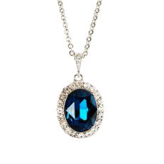 Oval sapphire silver pendant encased in diamonds 