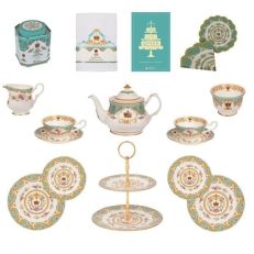 A turquoise and white tea-set with a gold pattern, crowns, and roses design. Set includes teapot, milk jug, napkins, large and small plates, sugar bowl, tea tin, tea towel, cake stand, teacups and saucers and recipe book