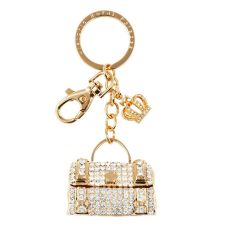 A gold and crystal keyring with a hanging charm in the shape of a clutch handbag and a mini royal crown. 