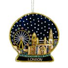 A hanging decoration in the shape of a snowglobe with London skyline embroidered inside it