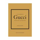 Gold book cover with Gucci logo