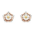 A pair of sterling silver stud earrings in the shape of a Tudor rose with a mix of silver, rose gold and yellow fold in each stud. 