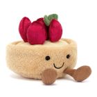 A plush soft toy in the shape of a strawberry tarte with four velvety plush, red strawberries on the top and an embroidered smiley face. 
