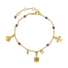 A gold plated charm bracelet with the Crown of India charm as well as an orb and cross charm. The bracelet chain includes six purple glass beads.