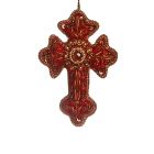 A red, fabric cross with gems and gold cord hanging decoration