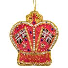 A red fabric crown hanging decoration with coloured beads. Coronation 2023 text is embroidered on the front 