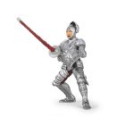 Children's toy knight figurine in silver armour