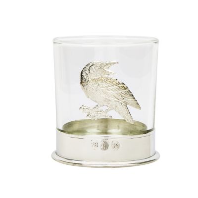 Whisky glass with pewter base and raven badge