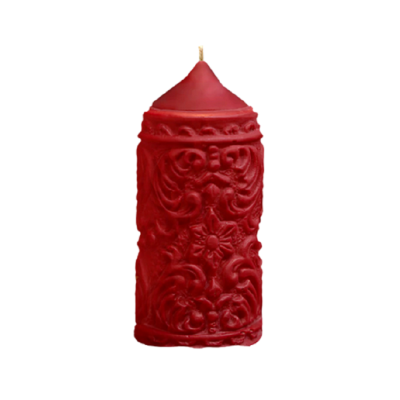 Red cylinder candle with baroque style engraved pattern