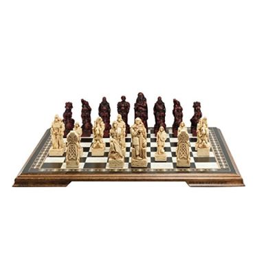 Celtic Unpainted Chess Set - A red and white chess set featuring historic Celtic characters and artefacts. 