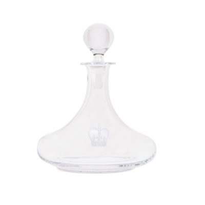 Crown Glass Decanter - A clear decanter featuring a white crown at the base.