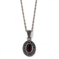 Garnet and marcasite oval silver pendant