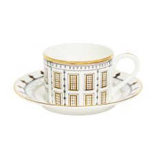 White china teacup and saucer with black and gold geometric design of Kensington Palace

