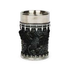 Stainless steel shot glass with a sculpted black raven and medieval brickwork