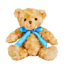 Hillsborough Castle Palace Bear 20cm - A light brown bear wearing a light blue ribbon with 'Hillsborough Castle' written in white. A gold crown is embroidered on one foot.